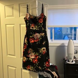 Black slim fitting dress with flower pattern